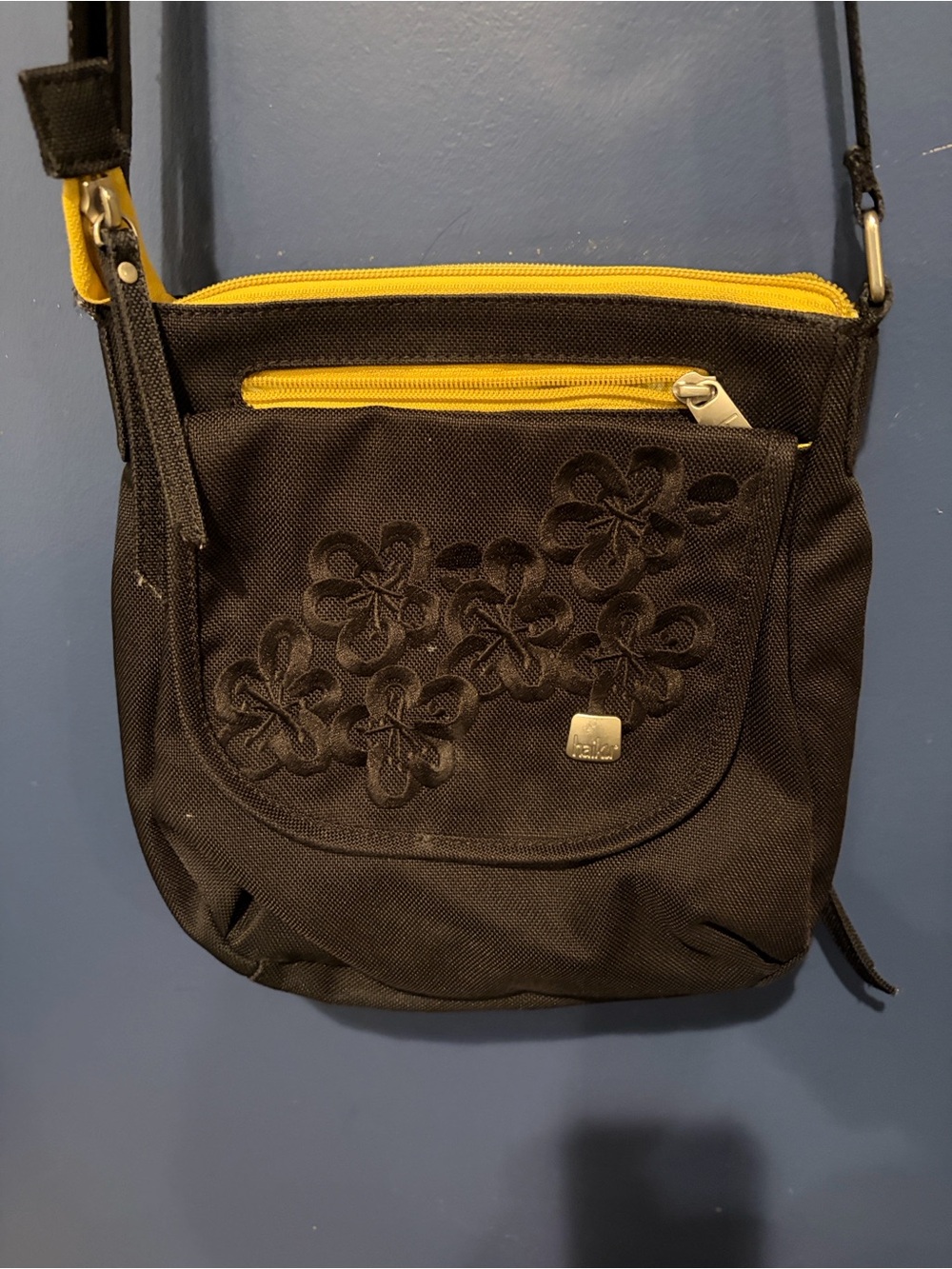 Haiku Black Crossbody Bag with Yellow Trim and Floral Embroidery